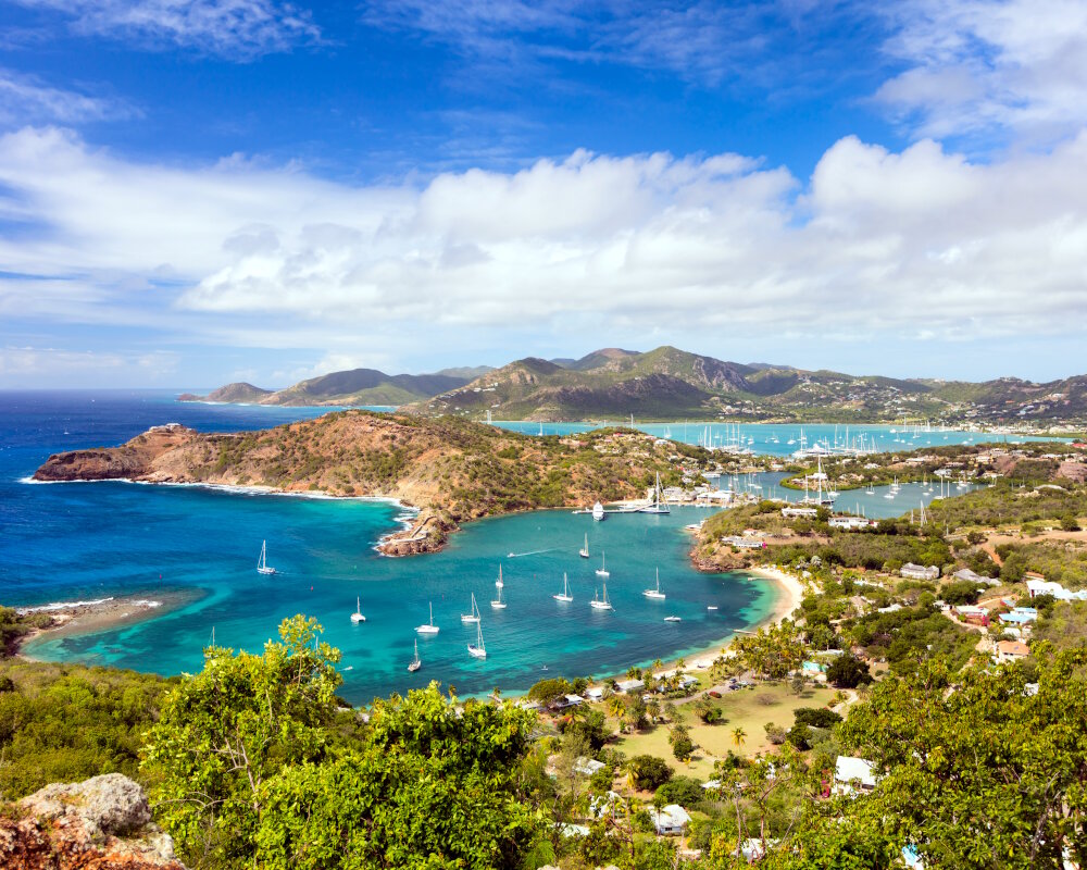 A panoramic view of the rugged coastline of English Harbour from Shirley Heights on the island of Antigua A panoramic view of the rugged coastline of English Harbour from Shirley Heights on the island of Antigua