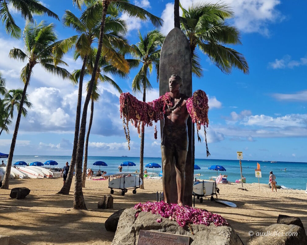 The statue of Duke Kahanamoku on Waikiki Beach honors the father of modern surfing
