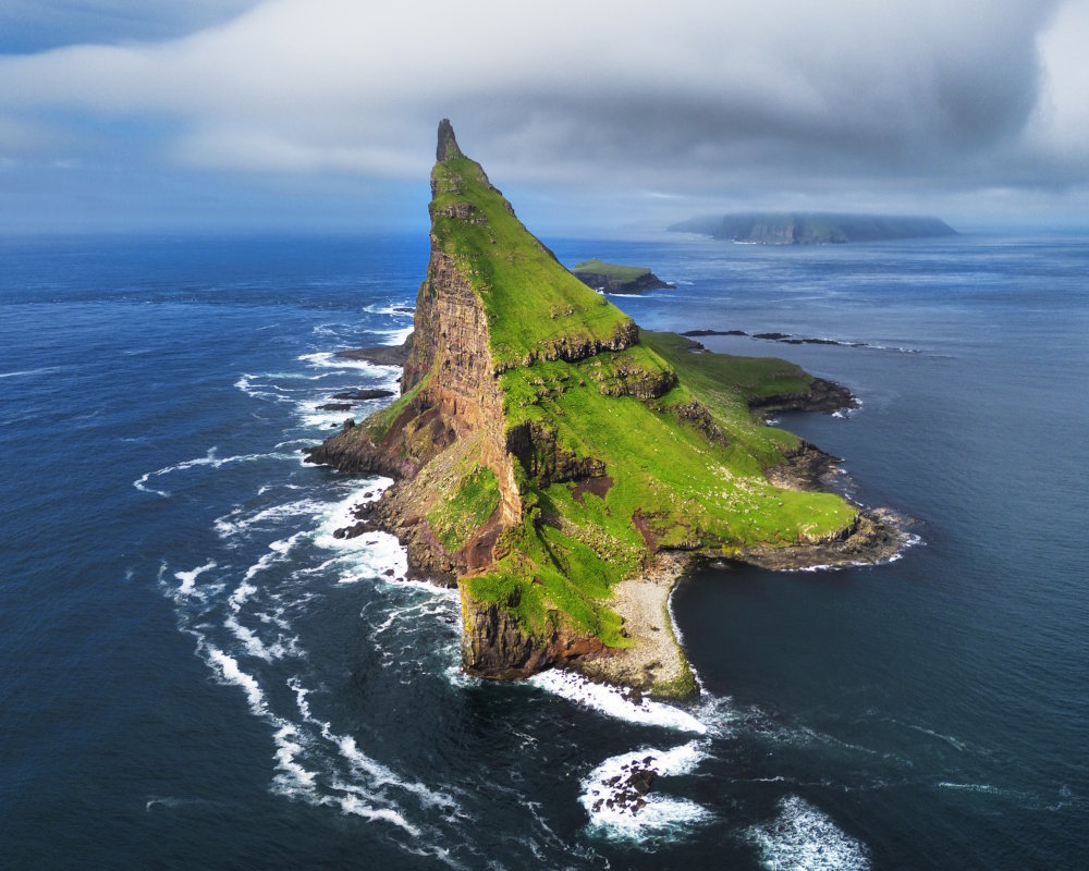 Aerial view of the islet Tindhólmur, located west of Vágar island, in the Faroe islands