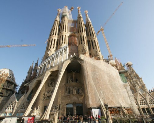 The Sagrada Familia reveals itself from the Passion facade The Sagrada Familia reveals itself from the Passion facade