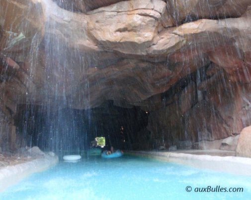 The river is both a place to relax and a mode of transport for exploring the water park