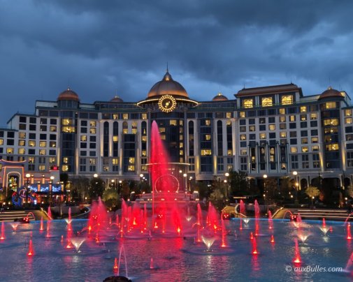 The fountains light up at night in front of Universal Helios Grand Hotel The fountains light up at night in front of Universal Helios Grand Hotel