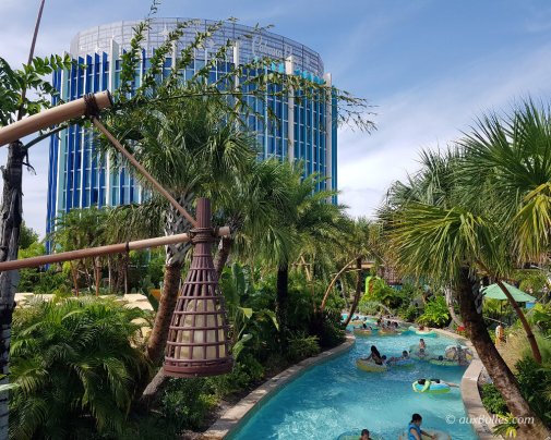 The Cabana Bay hotel and the TeAwa The Fearless River winding through Volcano Bay park and its lush vegetation