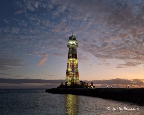 Sunset over the iconic lighthouse on Ocean Cay, MSC's private island in the Bahamas