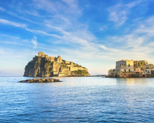 The Aragonese Castle, an imposing medieval fortress built on a rocky islet connected to Ischia Island by a bridge