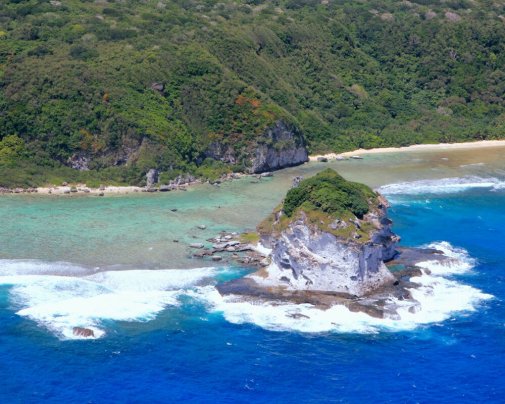 Aerial view of Saipan with Bird Island, its lagoon, and white-sand beach Aerial view of Saipan with Bird Island, its lagoon, and white-sand beach