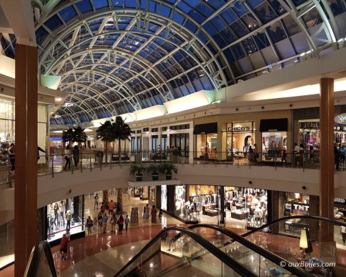 A view of the interior of the Florida Mall with its shops at night A view of the interior of the Florida Mall with its shops at night