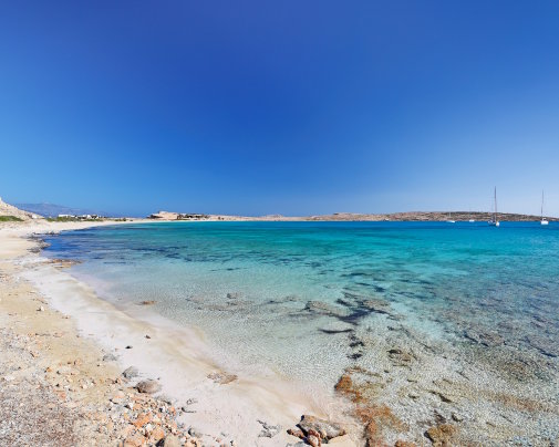 Pori Beach on Koufonissi, lined with white sand and turquoise waters in the Small Cyclades