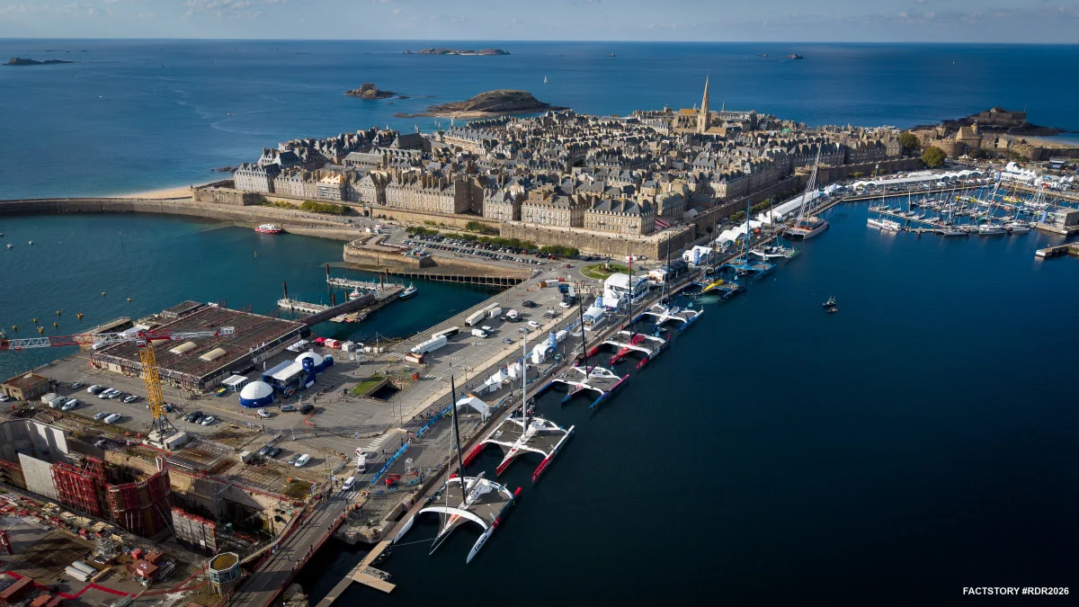 Aerial view of Ultim trimarans moored along the quays in Saint-Malo ahead of the start of the 2026 Route du Rhum – Destination Guadeloupe