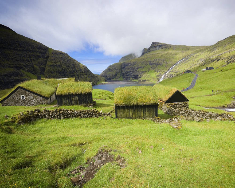 The small village of Saksun, with its turf-roofed farmhouses and natural lagoon, in the Faroe islands